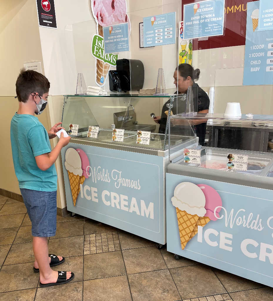A child orders ice cream from the Oceanside Co-op location