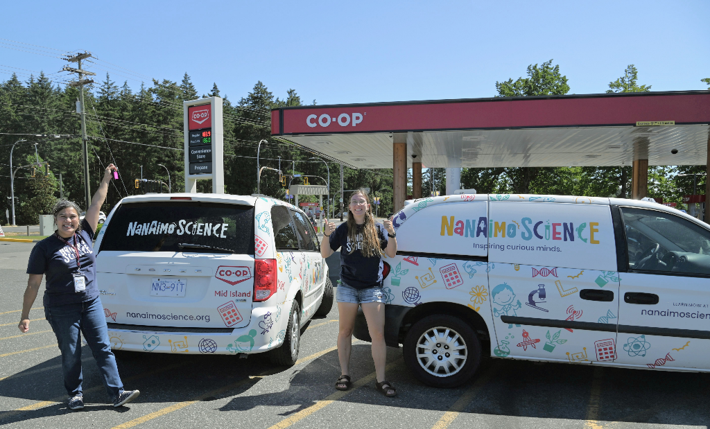 Nanaimo Science Executive Director Elaine Parker, and Outreach Coordinator Maddy Hart with the new Science on the Move vehicles at Mid Island Co-Op on Bowen Road in Nanaimo.